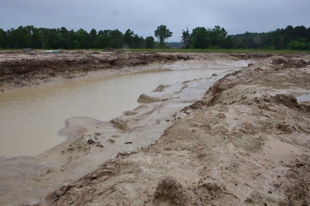 detention pond in houston texas in poor condition