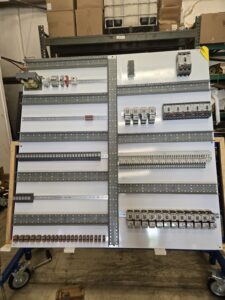 Lift station control panel backplane during fabrication at Stormwater Professionals Group
