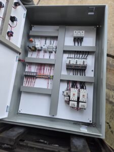 Wired interior of a lift station control panel built by Stormwater Professionals Group